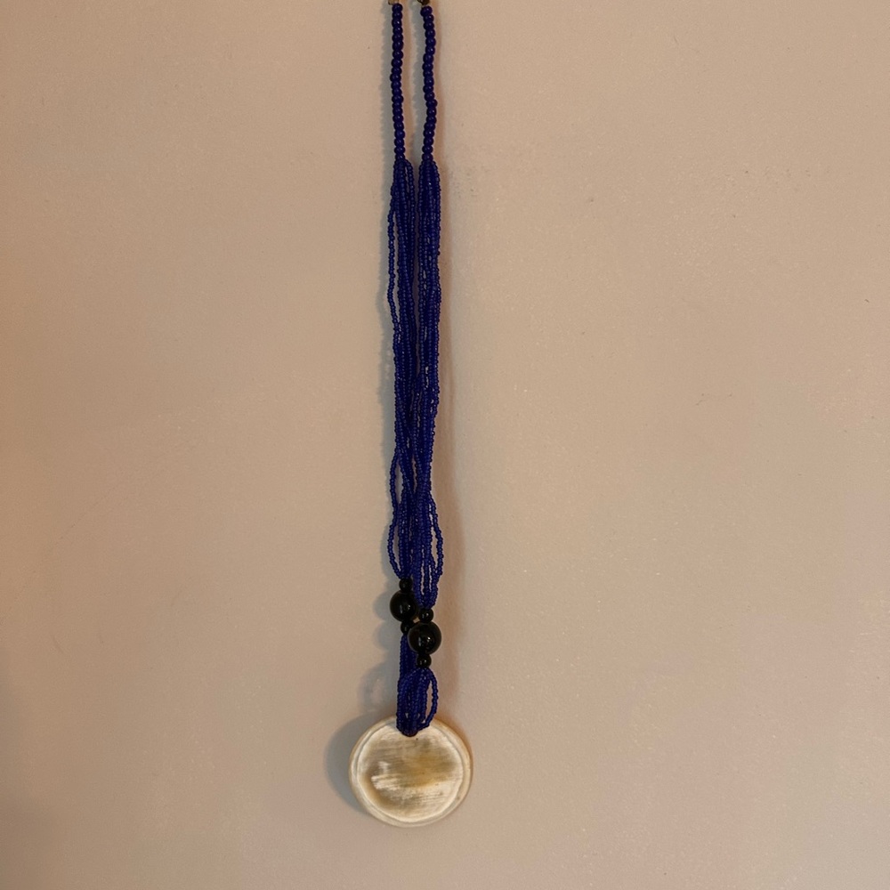 African Blue Beaded Necklace with Bone Pendant